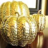 Tack or pin your pumpkin: You'd be surprised at the effect over-lapping thumb tacks can have. To jazz up the design, throw in some ball-end straight pins for color. Image courtesy of Bobvila.com.